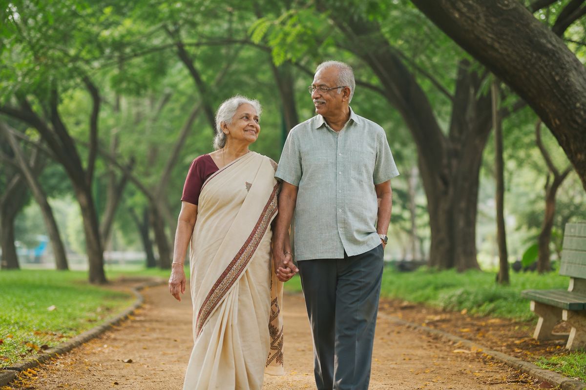 Elderly couple walking together outdoors with quiet confidence
